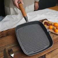 ราคา กระทะทอดสเต็กด้ามไม้เหล็กหล่อกระทะสเต็กใช้ในบ้านก้นแบนหนาพิเศษเตาแม่เหล็กไฟฟ้าแบบไม่เคลือบผิวใช้สำหรับเตาแก๊ส (20011079537)