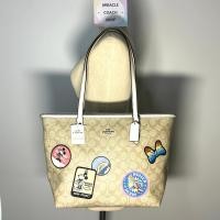 ราคา กระเป๋า Coach แท้ รุ่นลิมิเต็ด MINNIE มีตำหนิด้านใน ลดราคาล้าง stock COACH 29358 LIMITED EDITION CITY ZIP TOTE IN SIGNATURE CANVAS WITH MINNIE MOUSE PATCHES CLEARANCE (21287028826)