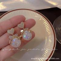ราคา ต่างหูรูปหัวใจ ประดับจี้ไข่มุกสีขาวครีม (21099465767)