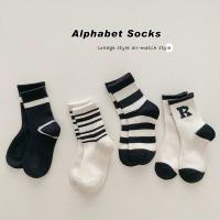 ราคา ถุงเท้าครึ่งน่องลายทางสำหรับเด็กถุงเท้าครึ่งน่องลายขวางสีดำและสีขาวสไตล์เกาหลี (21035505445)