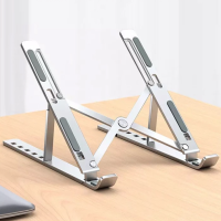ราคา Laptop Stand แท่นวางโน๊ตบุ๊ค พับเก็บได้ กันลื่น ปรับได้ 7 ระดับ Notebook Stand (20742163630)