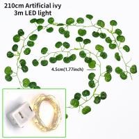 ราคา 2M ดอกไม้ประดิษฐ์ พวงเถาองุ่นใบไม้สีเขียวปลอมไม้เลื้อยเทียม ที่ตั้งไวน์ใบไม้ปลอมการตกแต่งบ้านพร้อมไฟสาย 3M LED (20368739504)