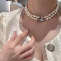 ราคา สร้อยคอดาวเสาร์ประดับมุกสองชั้นกระดุมแม่เหล็ก Vivienne Westwood สำหรับผู้หญิงที่มีโพรงและความรู้สึกสูงของโซ่ไหปลาร้าซ้อนใหม่2023แบบดั้งเดิม (20638935526)