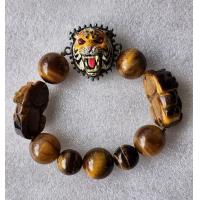 ราคา พญาเสือ รุ่นบูชาครู หลวงพ่อเปิ่นวัดบางพระ ปี 2554 ร้อยเป็นข้อมือเสริมอำนาจบารมี แก้ดวงตก แก้ปีชง ร้อยพร้อมไทเกอร์อาย หินตาเสือ ครับ (19417013825)