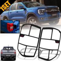 ราคา ครอบไฟท้าย ครอบกันรอยไฟท้าย รุ่น ฟอร์ด เรนเจอร์ FORD RANGER XLT XLS ปี 2022 2023 สีดำด้าน โลโก้ RANGER สีแดง 2 ชิ้น (15320972863)