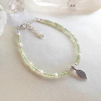 ราคา สร้อยข้อมือเงินหินเพอริดอท ไข่มุก Peridot Pearl (16639136476)