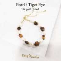 ราคา ข้อมือแฟชั่นมุกแท้ประดับหินไทเกอร์อาย สายปรับรูดฟรีไซต์ ชุบทอง18K (18344697529)