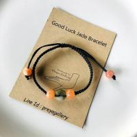 ราคา สร้อยข้อมือถัก ประดับหยกมงคล หยกน้ำผึ้งสีส้ม เชือกเทียนสีดำ ปรับขนาดได้ กำไลข้อมือหยก สร้อยข้อมือหิน แถมฟรี พวงกุญแจกระเป๋า 9 11 cm 1 ใบ (9657603130)