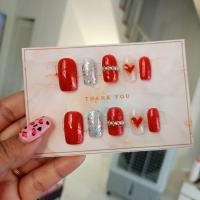 ราคา เล็บปลอมสำเร็จรูป โทนสีแดง เหมาะทุกเทศกาล แถมฟรีกาว ตะไบ (21177954877)