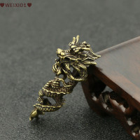 ราคา Nnuo รูปปั้นมังกรจักรราศีทำจากทองเหลืองสไตล์วินเทจพวงกุญแจรถยนต์จี้รูปสัตว์โลหะเครื่องประดับตั้งโต๊ะสำหรับบ้าน (20412379618)