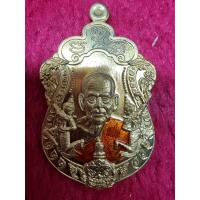 ราคา รุ่นเศรษฐีทวีทรัพย์ ๙๙ เนื้อทองทิพย์ หลังเรียบลงยาจีวร เลข 35 หลวงพ่อพัฒน์ (16528595236)