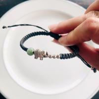 ราคา สร้อยข้อมือเชือกถัก สร้อยข้อมือแฮนด์เมด เชือกเทียนถัก สีดำ ประดับหยกเขียว 6 mm และโรเดียมรูปช้าง ส่งฟรี แถมพวงกุญแจแฮนด์เมด 1 ชิ้น (18507936174)