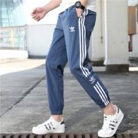 ราคา Adidas กางเกงวอร์มขายาวสำหรับผู้ชายกางเกงวิ่งกางเกงกีฬาแบบลำลองทรงหลวมสำหรับฤดูใบไม้ผลิและฤดูใบไม้ร่วง (10347847886)