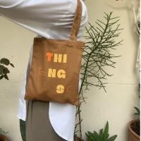 ราคา T THINGS MINI THINGS TOTE white caramel basil (16631965535)