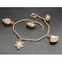 ราคา สร้อยข้อมือ นาก40 ลายกระพรวน เต่า หอย ตุ้งติ้ง งานเก่า หลุดจำนำ นน. 7.27 g (047765)