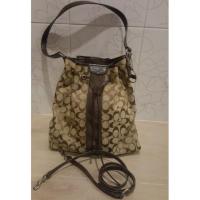 ราคา Used Coach Signature Stripe Drawstring shoulder baf รุ่น f30581 (1956038366)