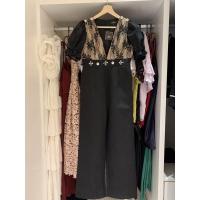 ราคา จั้มสูทขายาว งานป้าย Jidapa สีดำแต่งลูกไม้ (22004971128)