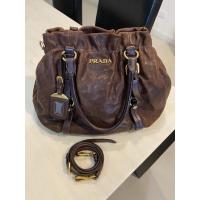 ราคา ส่งฟรี‼️กระเป๋า Prada ของแท้ (มือสอง) (12096230035)