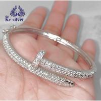 ราคา 【 #กำไลตะปู 】 กำไลเงินแท้ทรงตะปู เคลือบทองคำขาว ดีไซน์ฝังเพชรcz เม็ดเล็กๆ เพื่อเพิ่มความเรียบหรู (สวมใส่แบบตัวล็อก) (20958788091)