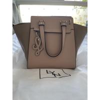 ราคา กระเป๋า สะพาย มีสายยาว สีชมพู ยี่ห้อ lyn (9922003613)