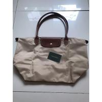 ราคา Longchamp สีเบจแท้100% ใหม่มากมือสองใช้ไม่เกิน5ครั้ง ขาย2000 (5752069727)