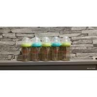 ราคา ขายยกเซ็ต ขวดนม Pigeon รุ่นสีชา คอกว้าง แบรนด์แท้มือสอง ขวด 5 oz. แถมจุกนม ไซส์ S + M (9813682427)