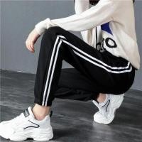ราคา กางเกงขายาวทรงสปอร์ตสีพื้นแต่งด้วยแถบสีขาว2เส้น มีเชือกผูก มีกระเป๋า 2 ข้าง ผ้ายืดได้ตามตัว ทรงขาจั้มรุ่น9881# (5932997830)