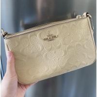 ราคา **Sold** กระเป๋า COACH แท้ หนังแก้วปั๊มลาย Coach มีสายยาว รุ่น Limited COACH 56518 สีครีม (8158875207)