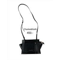 ราคา กระเป๋าcharles&keithสีดำ แท้100% (21300617178)