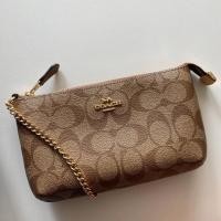 ราคา COACH LARGE WRISTLET IN SIGNATURE CANVAS #F88035 (6120664330)