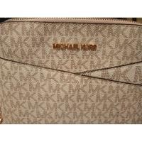 ราคา กระเป๋าสะพายมือสองMichael Kors Jet Set Travel MD Dome Crossbody Bag Powder Blush Multi 35F1GTVC6B (27600277494)