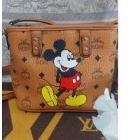 ราคา กระเป๋าสะพายข้าง mcm สีน้ำตาลมิกกี้หนังแคนวาสมือสอง (22688546153)