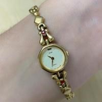 ราคา ส่งต่อ นาฬิกา Alba ผู้หญิงสีทอง ประดับพลอยสีแดง ของแท้ (25311481208)