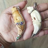 ราคา เครื่องรางของขลัง​เขี้ยวหมีจับเงินแท้ (3818580243)