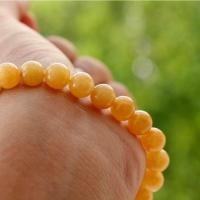 ราคา สร้อยข้อมือหยกหยกเหลืองน้ำผึ้ง 7.8 mm. สร้อยข้อมือหยก หยกพม่าแท้ 100% ถ่ายจากสีธรรมชาติ (22806069849)