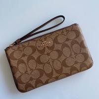 ราคา COACH LARGE WRISTLET IN SIGNATURE CANVAS #F58695 IME74 (4717411695)
