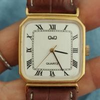 ราคา นาฬิกาญี่ปุ่นมือสอง Q&Q หน้าขาวหลักโรมัน ตัวเรือนสีทองสวย เรียบหรู ระบบ quartz (21561856520)