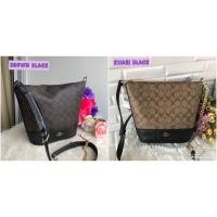 ราคา Coach แท้ ✔️ พร้อมส่ง กระเป๋าทรงถัง สะพายไหล่ | Coach Small Paxton Duffle in Signature Canvas (6301875995)