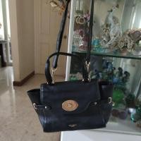 ราคา กระเป๋าสะพายหนังสีดำ ยี่ห้อ COACH แท้ (มือสอง) (29557362595)