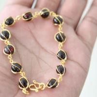 ราคา สร้อยข้อมือทองคำแท้ 90 ประดับพลอยโกเมนแท้100% 12เม็ด (27070277850)