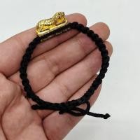 ราคา ตะกรุดพญาเสือเผ่นถักเป็นสร้อยข้อมือ หลวงพ่อเปิ่น วัดบางพระ รุ่นนี้ผ่านพิธีพุทธาภิเษกเกี่ยวกับด้านแคล้วคลาดคงกระพัน (27616218146)