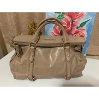 ราคา กระเป๋าหนังแท้มือสอง Miu Miu แท้ รุ่นโบว์ (8161049192)