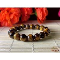 ราคา Tiger's Eyes สร้อยข้อมือหินตาเสือ คดไม้สัก ขนาด10มม. by maleeshop (9264024484)