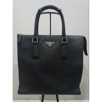 ราคา PRADAกระเป๋าทรงถือเอกสารหนังแท้สีดำอะไหล่เงินปั๊มทุกจุด ขนาด13.5" (29332361958)