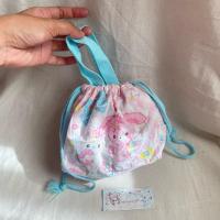 ราคา กระเป๋าถือหูรูด Bonbonribbon sanrio สีชมพูฟ้าสวย✨มือสอง สภาพดี (26686067605)