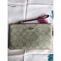 ราคา กระเป๋าคล้องมือ Coach มือ2ของแท้ (10917311608)