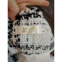 ราคา สูททำงาน​ สีดำขาวสลับ​ ผ้า​chanel​ ไซส์S​ กระเป๋า2ใบ​ มีซับใน (15192497619)