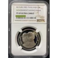 ราคา เหรียญนิกเกิลขัดเงา 10 บาท NGC PF69 รองแชมป์ วาระ72ปี ธนาคารออมสิน พศ 2528 (15334018291)