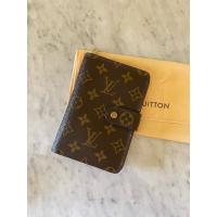 ราคา “Used LvMonogram Compact Wallet” (26662916382)