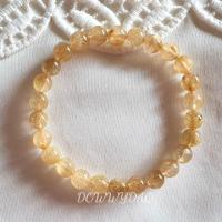 ราคา สร้อยข้อมือหินแท้ ไหมทองขนาด 7 มิล ควอทซ์ใส ไหมละมุน (3428586641)